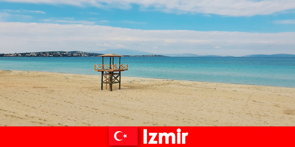 Ontspannen vakantiegangers zullen betoverd worden door de stranden in Izmir, Turkije